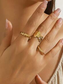 Elegant Minimalist Gold Tone Ring Set - Includes Simple Band, Heart Stacking Ring, And 3D Flower Ring, Versatile For Daily Wear, Commute, And Dates - Gold - View 1