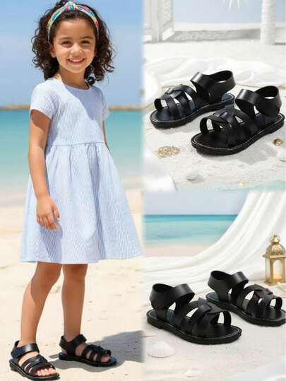 1双黑色防滑厚底优质PU皮鞋面交叉旋转设计时尚儿童平底凉鞋，复古简约风格魔术贴搭扣，适合搭配公主裙和连衣裙，男女童均适用，适合3-16岁学生日常穿着，生日派对、假期、海滩等场合，2026春夏新款。