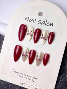 10片手工制作的短款杏仁形假指甲，法式美甲贴纸，红色、粉色、紫色可选，可爱设计，带有猫眼效果和闪粉点缀，蝴蝶结和撞色图案，时尚简约风格，附赠美甲工具，适合秋冬季女性和女孩的美甲用品。 - 彩色 - 查看 2