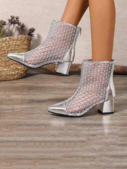 优雅百搭的踝靴，后跟配有拉链，女鞋采用粗跟设计，尖头中跟，透气网面，适合春、夏、秋季穿着。