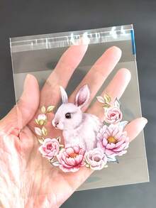 100个复活节兔子和花朵图案礼品袋，可爱兔子和春花图案透明自粘包装袋，4种不同图案混合装 - 非常适合复活节和主题派对礼品包装等。 - 彩色 - 查看 5