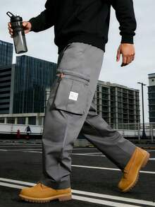 Quần cargo nam nhiều màu sắc, dáng rộng, nhẹ, phong cách đường phố ngoài trời thời trang với nhiều túi lớn và dây rút ở eo, phù hợp cho các hoạt động thể thao ngoài trời và mặc hàng ngày, món đồ thiết yếu đa năng cho mùa xuân. - Xám - Xem 2