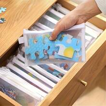 10 pièces Sacs à fermeture éclair en maille transparente - 3 tailles de sacs de rangement en maille plastique avec fermetures éclair sécurisées, convenant aux jouets, aux voyages, aux fournitures de bureau et aux puzzles - Sacs à fermeture éclair réutilisables, sacs de rangement de voyage, sacs fourre-tout pour jouets, avec fermetures éclair robustes - Sacs de rangement transparents et anti-poussière pour les voyages, les documents de bureau, les jouets et les puzzles, avec fermeture à cordon pour une organisation facile - Multicolore - Voir 5