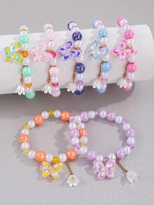 1 pulsera de niña con cuentas y dijes de mariposa y lirio del valle - Multicolor - Ver 1