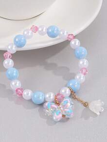 1 pulsera de niña con cuentas y dijes de mariposa y lirio del valle - Multicolor - Ver 8