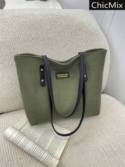 休闲纯色通勤大容量绒面实用手提包，简约百搭铆钉装饰标签女士单肩包，适合购物、装钱包、年轻女性、大学生、职场新人及白领人士。非常适合办公室、大学、工作、商务、通勤、户外活动、旅行和郊游等场合。