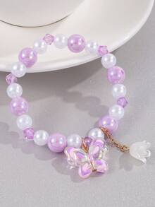 1 pulsera de niña con cuentas y dijes de mariposa y lirio del valle - Multicolor - Ver 11