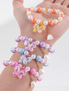 1 pulsera de niña con cuentas y dijes de mariposa y lirio del valle - Multicolor - Ver 3