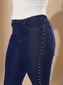 pthirillo Women's Dark Blue Flare Jeans With Butt-Lifting, High Waist, And Rhinestone Detail - Premium Rhinestone Jeans - Side Rhinestones - View 3