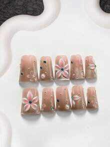 10件套凝胶美甲套装，亚克力美甲套装，包含手工制作的五瓣渐变粉色花朵、不对称白色水钻美甲装饰、手绘粉色花卉图案、银色猫眼设计，适合女士和女孩的手工按压式美甲贴片。 - 彩色 - 查看 17