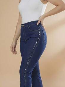 pthirillo Women's Dark Blue Flare Jeans With Butt-Lifting, High Waist, And Rhinestone Detail - Premium Rhinestone Jeans - Side Rhinestones - View 2
