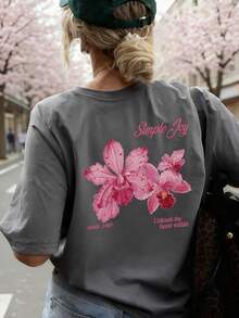 这款色彩缤纷的字母花卉印花圆领T恤是夏季女性时尚百搭的选择。这款印花T恤有白色和粉色两种颜色可选，适合度假穿着。休闲百搭。 - 深灰 - 查看 6