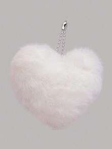 一款时尚的心形毛绒手提包。这款可爱蓬松的手提包饰有花朵爱心图案，非常适合秋冬季节日常使用。蓬松的包身点缀着精致的爱心图案，并采用磁扣设计。是青少年必备单品，非常适合日常使用、旅行和外出。 - 彩色 - 查看 11