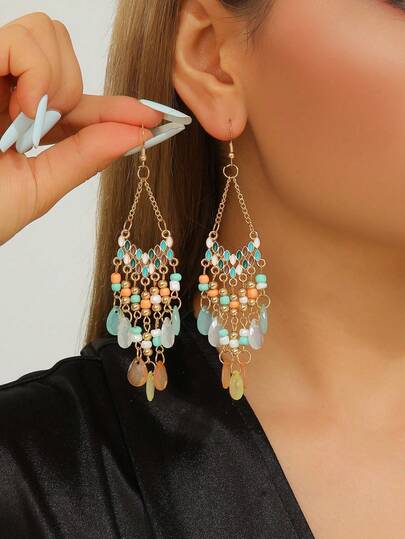 一对手工串珠耳环，夸张时尚，复古优雅，适合派对、度假、波西米亚风、欧式风、东南亚风、中东风等场合。