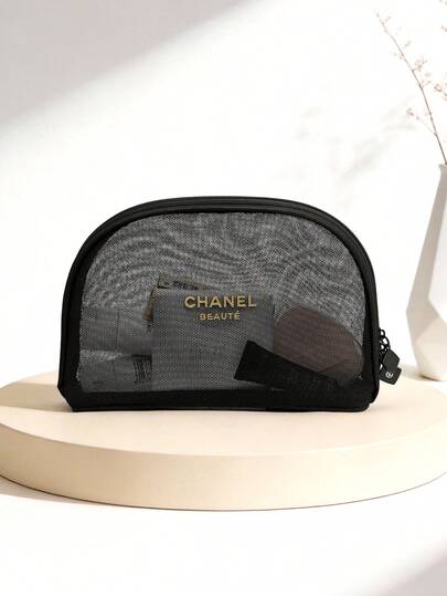 CHANEL Organizer na kosmetyki podróżne Materiel, przezroczysta, czarna siateczkowa saszetka zapewniająca łatwy dostęp
