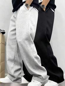 男士休闲运动两件套，宽松直筒版型，垂感好，适合居家和户外活动，也可作为情侣礼物。采用100%涤纶面料，配有抽绳腰带，可调节松紧，多种颜色可选。 - 彩色 - 查看 1