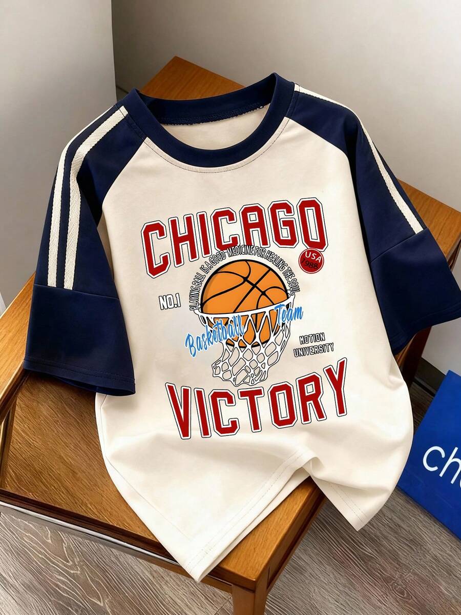تي شيرت بطباعة "الانتصار" لكرة السلة في شيكاغو للأولاد، بأكمام راجلان ذات لون متباين، قصة فضفاضة وراحة، ملابس علوية كم قصير مريح للربيع والصيف - لون مشمشي - مشاهدة 1