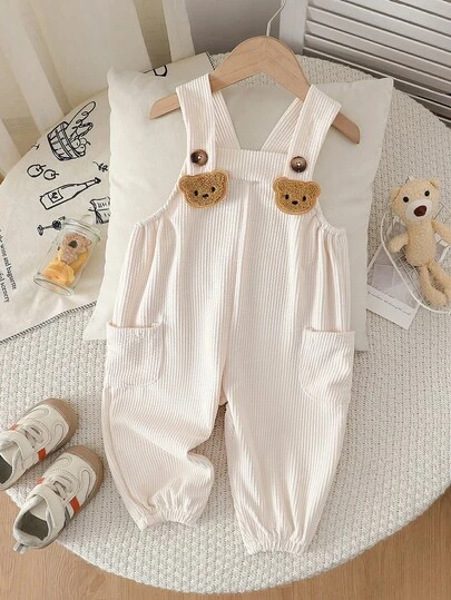 Baby Boys/Girls' Minimalist Solid Color Thick Strap Sleeveless Bear Pattern Dual Side Pocket Jumpsuit, Fashionable & Versatile, Suitable For Daily, Party, Outdoor In Spring/Summer