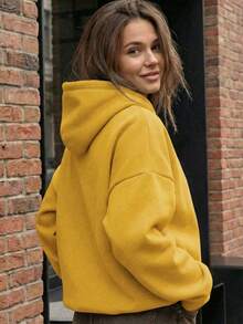 Thiết kế tối giản, áo hoodie dài tay rộng rãi, màu trơn thoải mái dành cho nữ, phù hợp cho mùa thu/đông, là món đồ không thể thiếu trong tủ quần áo, trang phục thường ngày, công sở và giải trí, áo kiểu casual giúp thon gọn vóc dáng, áo sweatshirt mềm mại và thoải mái, đồ cần thiết cho kỳ nghỉ, trang phục mùa xuân/đông dành cho nữ, áo khoác ngoài dành cho nữ, áo hoodie thời trang dành cho nữ. - Màu vàng - Xem 6