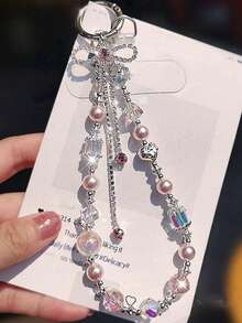 女士蝴蝶装饰手机挂绳，精致水晶吊坠腕短串珠配饰，户外旅行购物防丢手机带，时尚手机壳挂绳 - 彩色 - 查看 16
