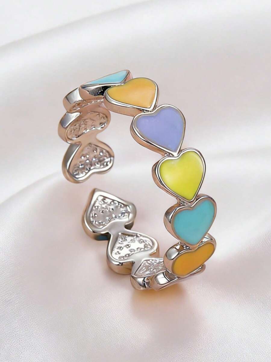 1 chiếc nhẫn hở hình trái tim nhiều màu sắc, thanh lịch và dễ thương, kiểu dáng tối giản, phù hợp cho nữ giới khi đi chơi, dự tiệc Valentine, đi nghỉ mát, làm quà tặng cho người yêu hoặc bạn thân.
