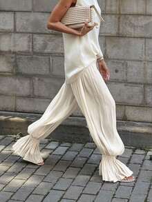 女士时尚优雅休闲裤，法式泡泡裤脚，纯色梭织面料，适合日常穿着和约会，春夏皆宜。 - 杏色 - 查看 2