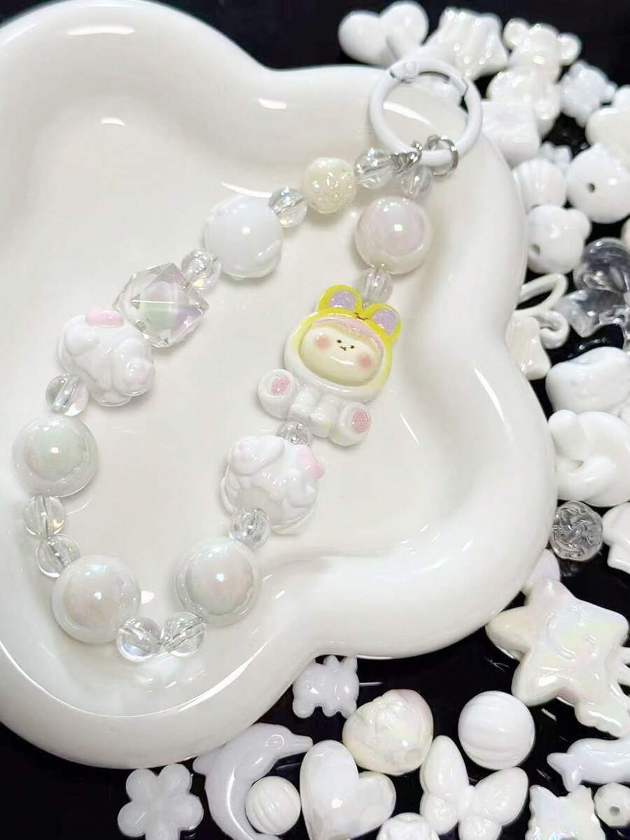 Śliczny naszyjnik z akrylowych koralików w kształcie kokardy, mały kwiatek, łańcuszek do telefonu komórkowego, wiszące akcesoria z linką wymieszaną z koralikami. Produkt jest używany do ręcznie robionych dekoracji, takich jak nakrycia głowy, ubrania, suknie wieczorowe, buty i kapelusze, wesela, Boże Narodzenie, rękodzieło itp. - Wielokolorowe - Zobacz 1