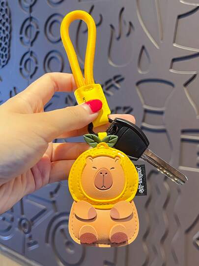 1个/2个随机款式 - 卡通创意PU皮革钥匙扣背包挂件，可爱学生背包配件，26个字母钥匙扣挂绳，汽车钥匙扣，饰品配件，适合作为日常佩戴礼物送给朋友、家人、粉丝，或作为派对/节日礼物，手机/包包装饰