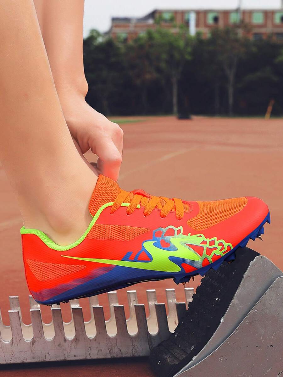 STARNOVO [Taille petite 1 taille] Chaussures à double étoile avec nouvelles pointes, chaussures de course moyenne distance pour hommes et femmes étudiants, chaussures de compétition de piste et de champ avec pointes professionnelles, chaussures de formation sportive avec pointes pour étudiants, chaussures de formation de piste et de champ avec pointes, taille 35-45 - Orange brûlé - Voir 1