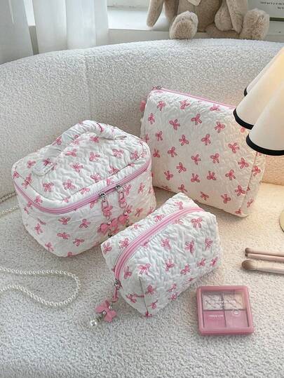 1件/套粉色蝴蝶结印花绗缝便携化妆包大容量旅行化妆包收纳包洗漱包护肤包，带蝴蝶结拉链，可爱便携收纳包，女士多功能收纳包，可收纳口红、卫生巾、硬币、钥匙、发夹、发圈等，是度假、日常使用和洗漱用品收纳的理想之选，也是送给女友的最佳情人节礼物和生日礼物。
