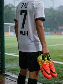 四季皆宜的运动比赛足球鞋，校园风足球鞋，足球训练鞋，比赛鞋，长钉防滑，不对称迷彩图案鞋面 - 橘色 - 查看 9