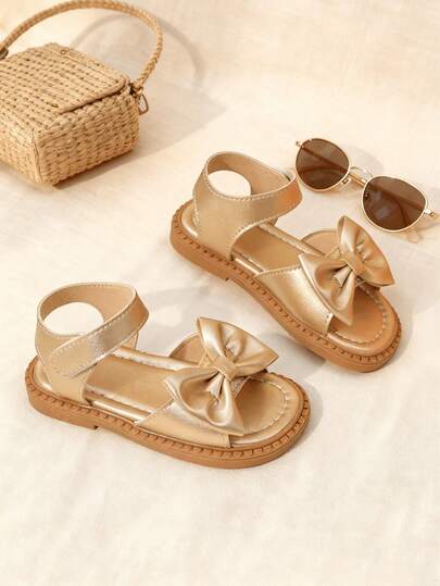 1 Pair Of Girls' Golden Bow Decoration PU Anti Slip Soft Bottom Exposed Toe Low Top Buckle Strap With Thick Bottom Flat Bottom Sweet Element Wind Sandals For Children's Dances/Family Gatherings