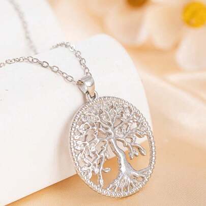 1件个性化创意生命之树镂空项链，时尚风格，金属银色男女通用吊坠项链，适合派对、聚会、郊游、日常穿搭以及作为礼物送给朋友。
