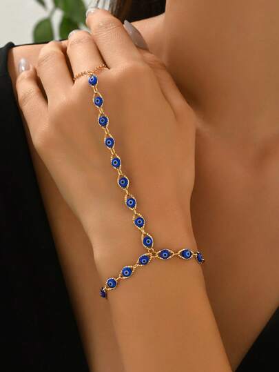 1 st minimalistiskt och mångsidigt armband med djävulsöga i metalldesign, modesmycke för kvinnor, lämpligt för vardagsbruk, shopping och sammankomster. Armbandets längd och pärlantal justeras slumpmässigt.