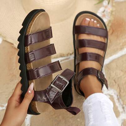 Sandalias deportivas de mujer con cuña de suela gruesa, hebilla y punta abierta calada