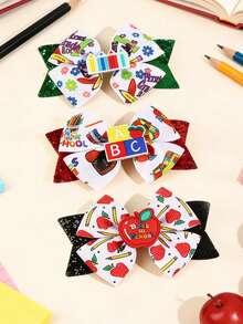 مجموعة من 2 قطعة من مشابك الشعر المزينة بالريبون والطباعة على شكل قلم وكتاب للبنات، إكسسوارات شعر للطالبات - متعدد الألوان - مشاهدة 1