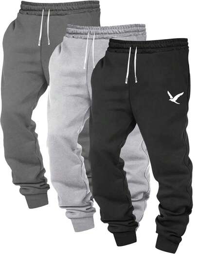 1 pieza Pantalón de chándal casual para hombres, corte holgado, adecuado para trotar, actividades en casa y al aire libre, también puede ser un regalo de boda. Hecho de tela 100% poliéster, con cordón ajustable en la cintura, disponible en varios colores.