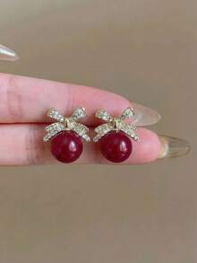 一对红色时尚奢华蝴蝶结耳钉，适合少女日常及节日佩戴。 - 蝴蝶結 - 查看 2