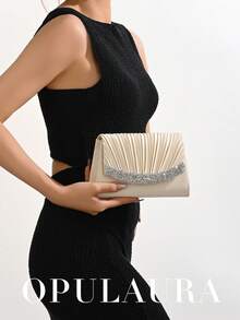 Túi xách mini xếp ly OpulAura Thu/Đông. Chiếc túi xách kiểu phong bì thanh lịch và thời trang, được đính đá lấp lánh và quyến rũ, được thiết kế dành cho phụ nữ, phù hợp cho các bữa tiệc, đám cưới, sự kiện buổi tối và các buổi họp mặt. Một lựa chọn lý tưởng cho phụ nữ tham dự các bữa tiệc, đám cưới, lễ tốt nghiệp và các bữa tối/tiệc chiêu đãi trang trọng, và cũng là một lựa chọn quà tặng tuyệt vời. - Màu be - Xem 8