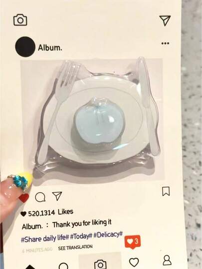 1 pieza Soporte de teléfono de resina acrílica con diseño de manzana INS, soporte plegable y portátil con cojín de aire para escritorio