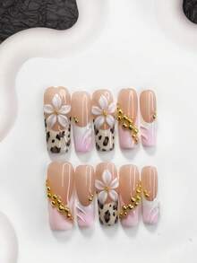 10片珍珠仙女风美甲套装，亚克力压制甲片，5瓣白色小花装饰配小金属珠，不对称金色水钻，棕纹混色，纯色波浪纹，豹纹法式甲片，送给女性和女孩的理想美甲礼物，手工制作的压制甲片 - 彩色 - 查看 11
