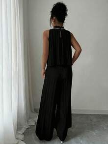 Bộ áo liền quần xếp ly bằng vải dệt đính ngọc trai, thích hợp cho kỳ nghỉ, du lịch và mọi mùa. - màu đen - Xem 4