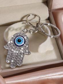 1 pieza Llavero de metal con dije de ojo azul de cristal y palma, estilo callejero hip hop, accesorio creativo para bolso, regalo unisex para todas las estaciones - Plateado - Ver 4