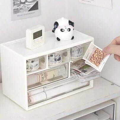 1个大容量多功能透明塑料桌面抽屉收纳盒，适合存放办公用品、化妆品和浴室用品，轻巧设计，适合家庭或办公室桌面使用。