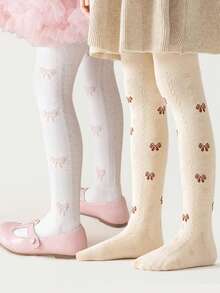 两件装儿童打底裤，采用薄针织面料，适合春秋季穿着，杏色和白色可选，饰有蝴蝶提花图案，可作外衣穿着，不易起球，透气舒适，多功能实用。 - 彩色 - 查看 9