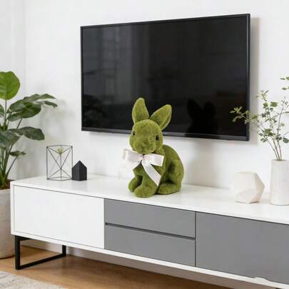 Flocked Moss Green Rabbit Figurine, This Adorable Rabbit Figurine Is A Great Home Decor Item With A Spring-Like Vibe, Perfect For Creating A Warm And Healing Atmosphere. Natural Texture: The Surface Is Crafted With A Flocked Process, Presenting A Delicate Moss Green Effect With A Soft Touch And A Fresh Natural Feel. Exquisite Design: The Three-Dimensional Crouching Posture, Paired With Dynamic Long Ears And Small Black Eyes, Creates An Endearing And Cute Look.