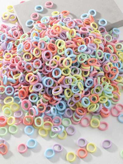 500款马卡龙色高弹力发圈，小巧可爱，适合日常休闲佩戴和户外活动。这些发圈是适合各种场合的时尚发饰，一年四季皆可使用。小巧的发圈适用于各种发型，是女士发饰的理想之选。它们还可以用来固定小巧精致的发髻。