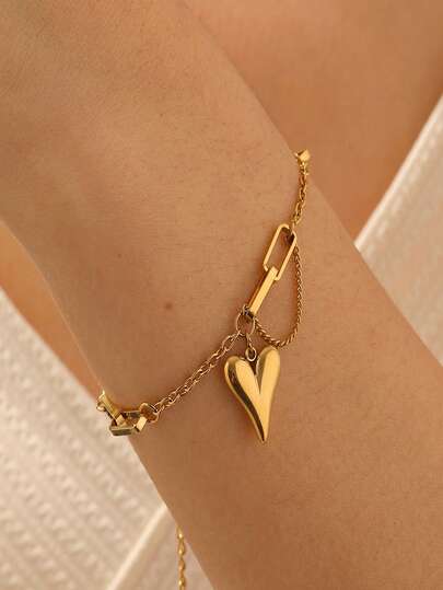 1 pieza Brazalete de acero inoxidable con declaración de corazón de doble punta irregular con flecos chapado en oro de moda para mujeres