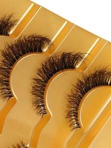 7对D卷翘猫眼假睫毛，蓬松轻盈，浓密柔软，透明梗，俄罗斯条状假睫毛，可重复使用，打造戏剧性凌乱妆效，仿貂毛假睫毛，适合新手化妆，易于单根嫁接，簇状假睫毛，可延长 - 交叉款 - 查看 4