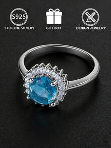 Anel feminino geométrico em prata de lei S925, com zircônia cúbica azul redonda cravejada em pavé, tamanho ajustável, ideal para uso diário ou para presentear, perfeito para noivado. Acompanha caixa para presente. - Prata - Ver 6